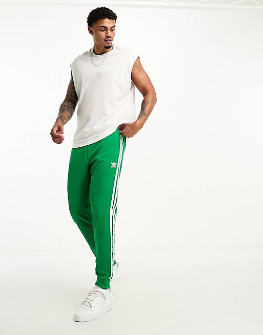 Læge Aubergine grænse adidas Originals joggers in green and white | ASOS