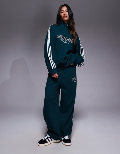 adidas Originals joggers in green with front graphic