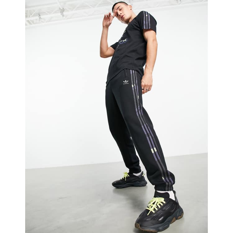 adidas Originals Joggers neri con tre strisce mimetiche