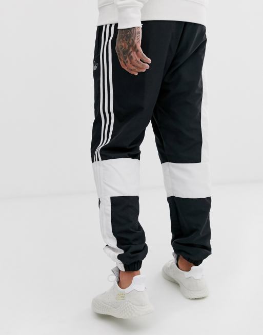 Adidas originals joggers with colour blocking clearance in black