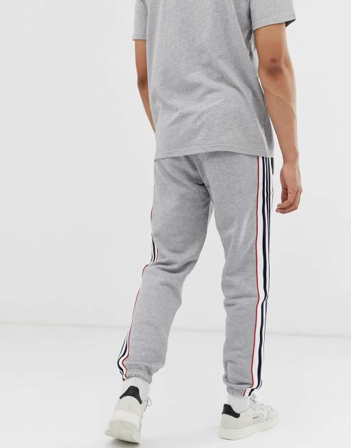 Adidas originals joggers 2025 with outline 3 stripes