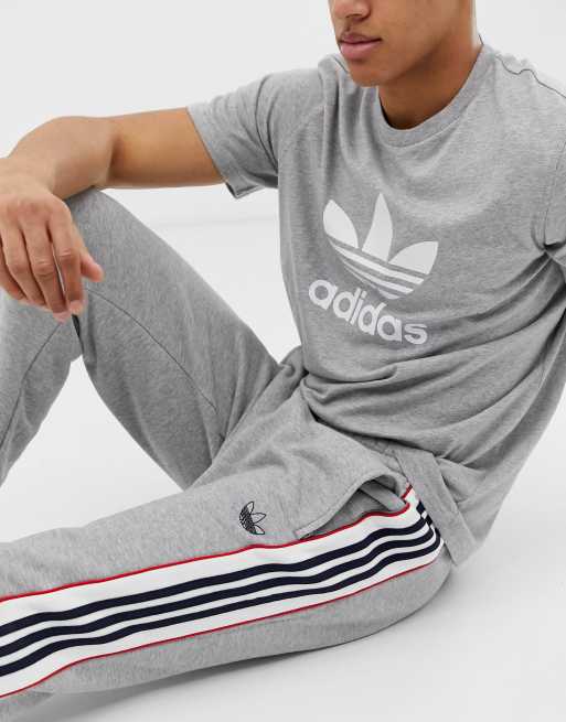 Adidas originals joggers 2025 with outline 3 stripes