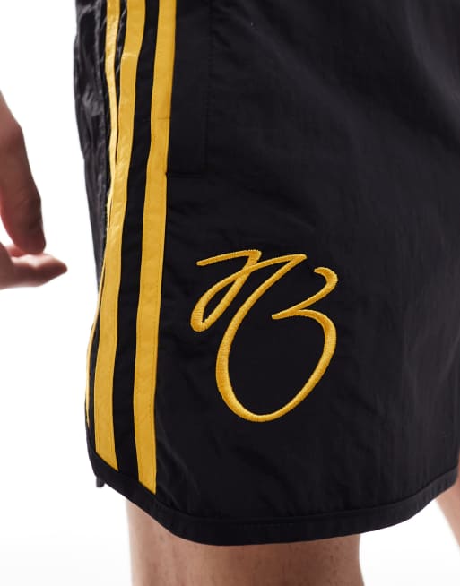 adidas Originals Jude Bellingham shorts in black and gold ASOS
