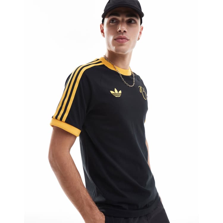 Adidas black and gold shirt on sale