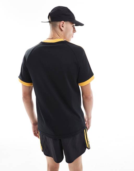 Adidas originals black and gold t shirt hotsell