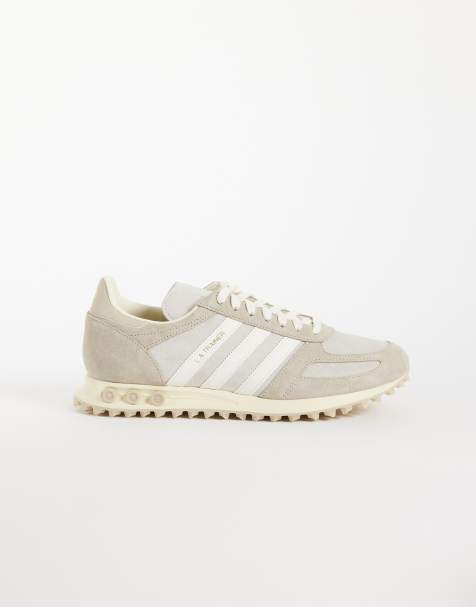 adidas Originals LA trainers in khaki and off white - view 1