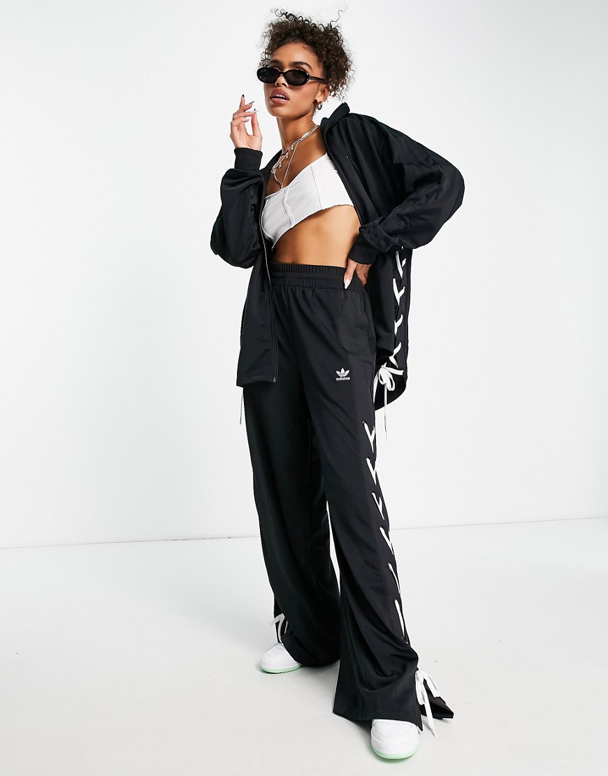 Adidas Originals laced up track pants in black