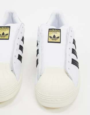 laceless white sneakers