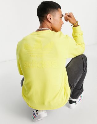adidas Originals large debossed trefoil chest logo sweatshirt in yellow - ASOS Price Checker