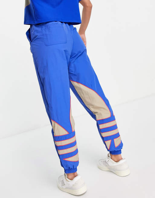 Adidas big logo discount track pants blue