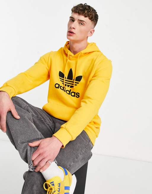 adidas Originals large trefoil hoodie in active gold