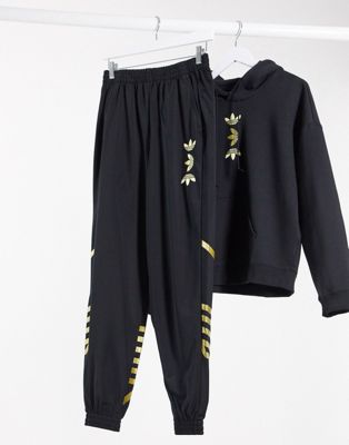 adidas black and gold track pants