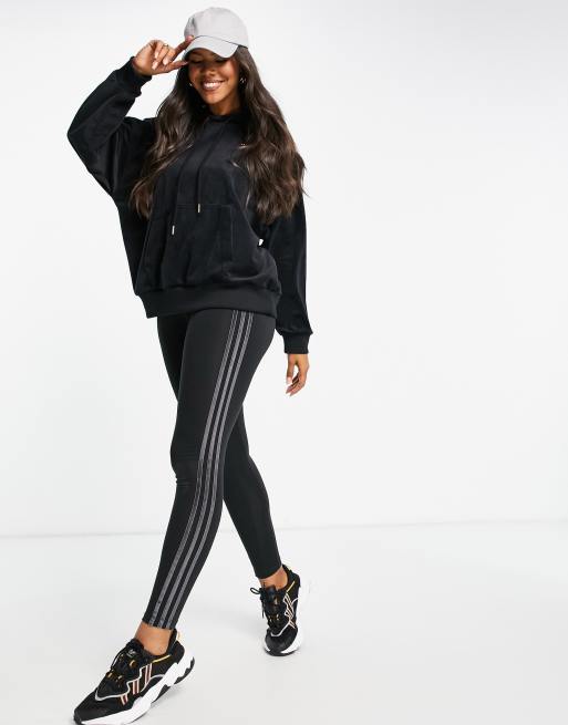adidas Originals - Legging in zwart met goudkleurig logo en strepen in kleurschakering