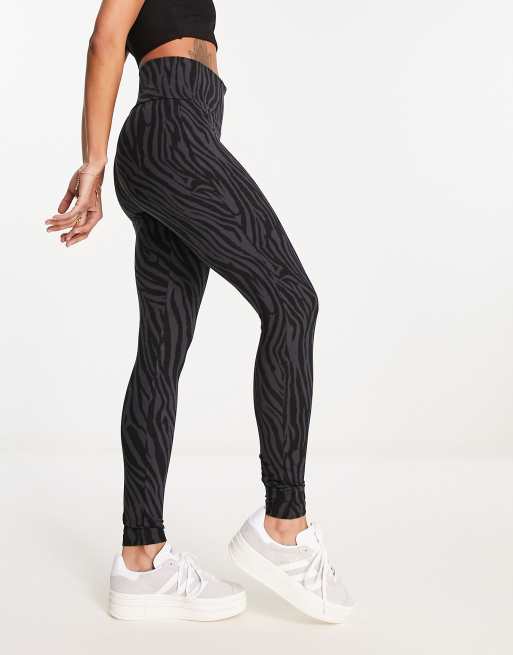 adidas Originals 'animal abstract' leggings in black with zebra print