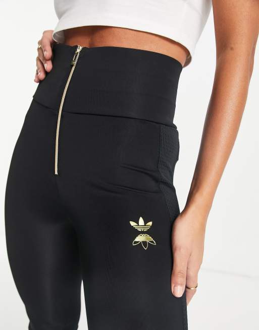 adidas Originals leggings in black with gold logo and zipper detail