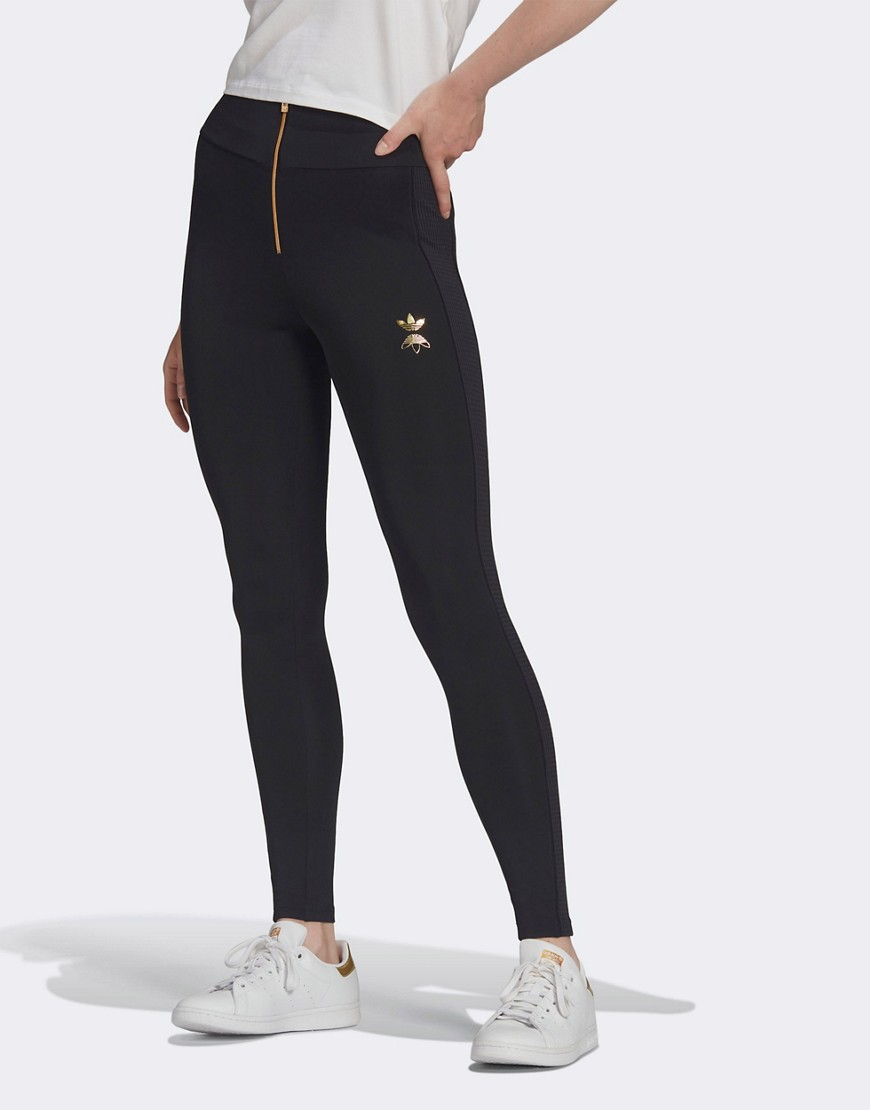 adidas Originals leggings in black with gold logo and zipper detail
