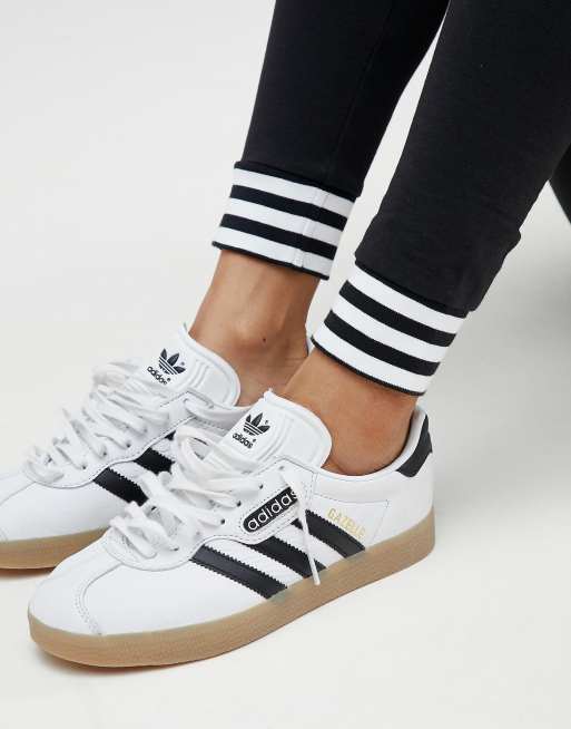 Adidas originals leggings with best sale striped cuffs in black