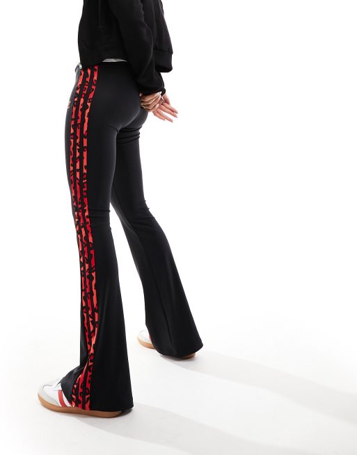 adidas Originals Leopard Luxe flared leggings in black and red leopard  three stripe