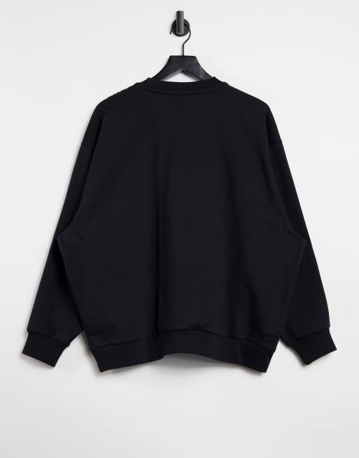 adidas Originals 'Leopard Luxe' oversized sweatshirt in black with leopard three stripes, 2 of 4