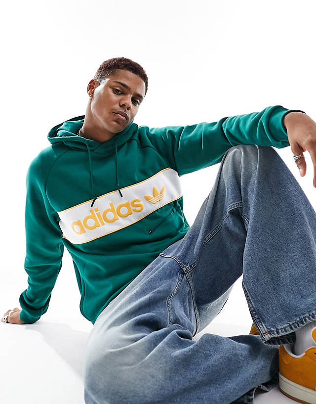 adidas Originals - linear logo hoodie in dark green and yellow