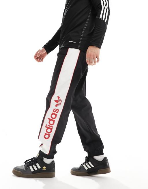 adidas Originals linear logo joggers in black white and red