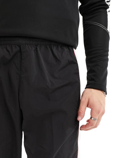 adidas Originals linear logo joggers in black, white and red