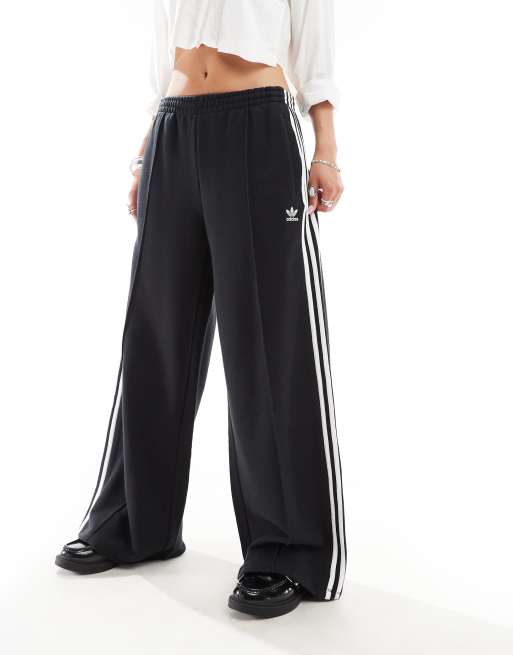 adidas Originals Lockere Jogginghose aus schwarzem Frottee mit weitem Bein und 3 Streifen ASOS