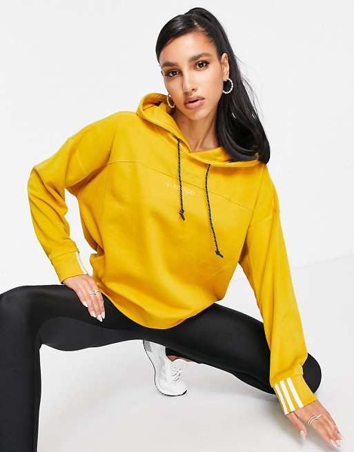 adidas Originals logo RYV fleece hoodie in mustard