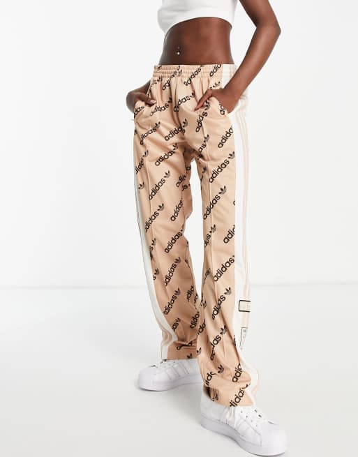 adidas Originals 'Logomania' repeat logo adibreak side popper track pants  in blush