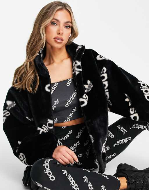 adidas Originals Logomania repeat logo faux fur jacket in black