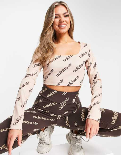 adidas Originals Logomania repeat logo leggings in black, ASOS