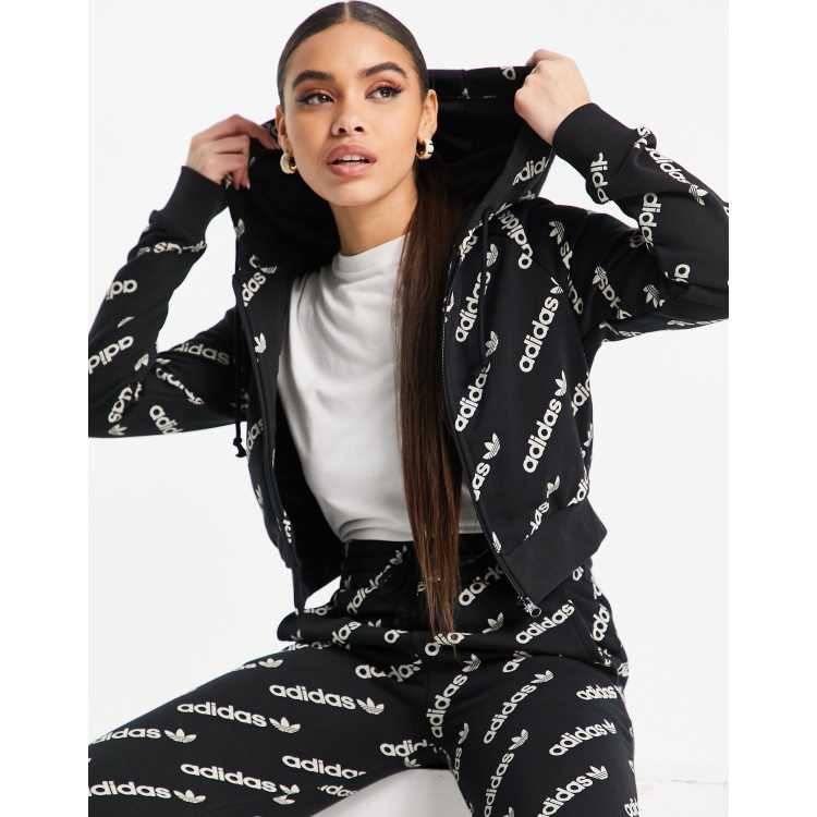 adidas Originals Logomania repeat logo leggings in black, ASOS