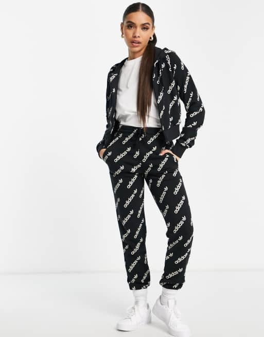 adidas Originals Logomania repeat logo leggings in black