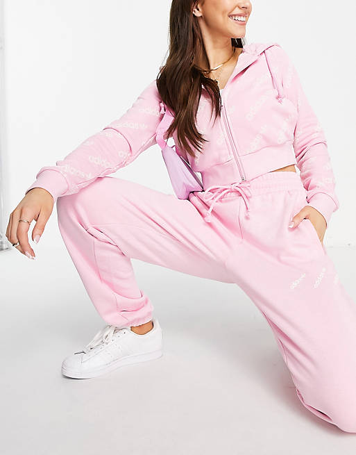  adidas Originals 'Logomania' repeat logo zip hoodie in pink 