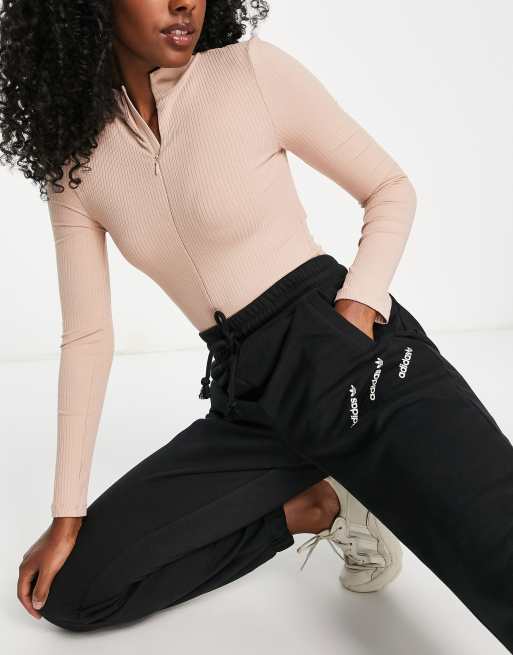 adidas Originals Logomania repeat logo leggings in black, ASOS