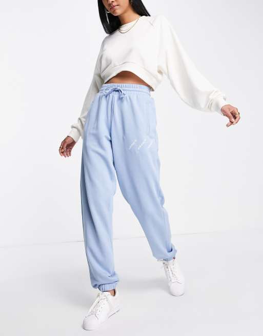 adidas Originals Logomania triple logo joggers in light blue - MBLUE | ASOS