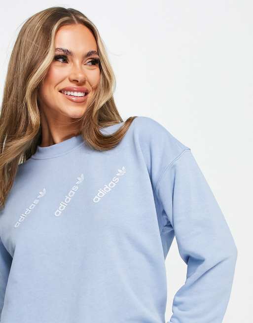 adidas Originals 'Logomania' triple logo sweatshirt in light blue