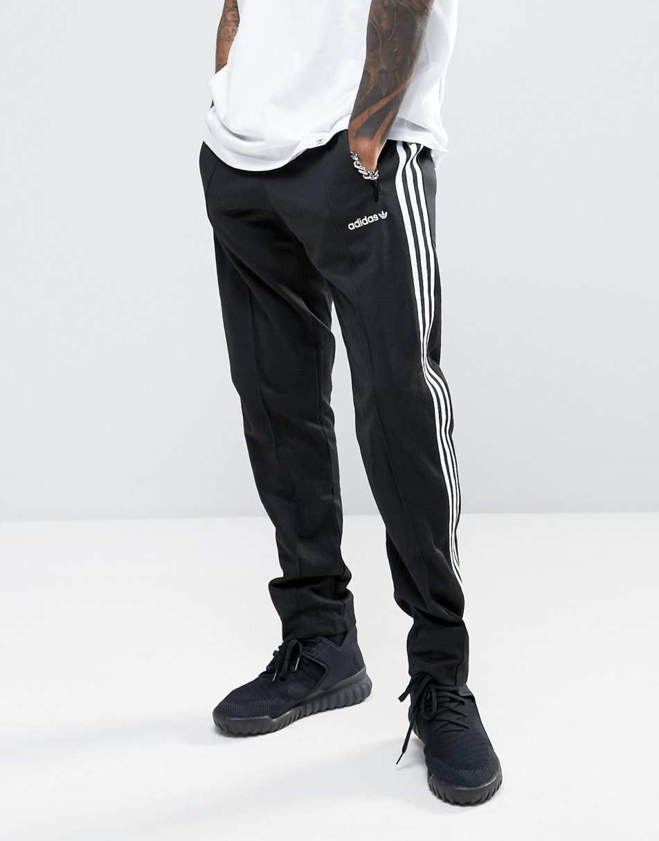 Adidas originals joggers. Джоггеры adidas черные. Джоггеры адидас мужские черные. Брюки спортивные adidas Essentials Tapered Joggers. Adidas Tape Jogger Pants.