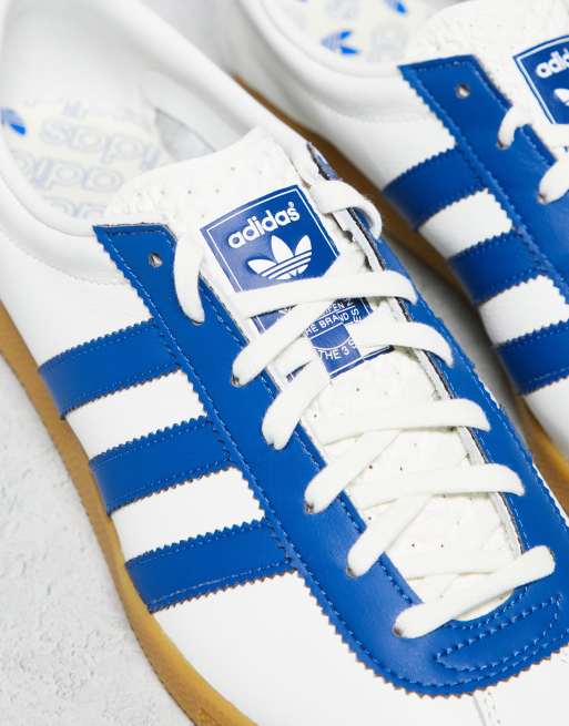 adidas Originals London trainers in white and blue