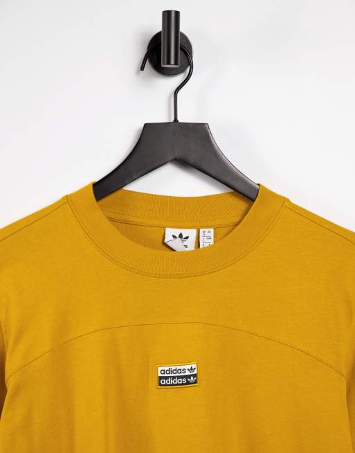 Mustard yellow adidas outlet shirt