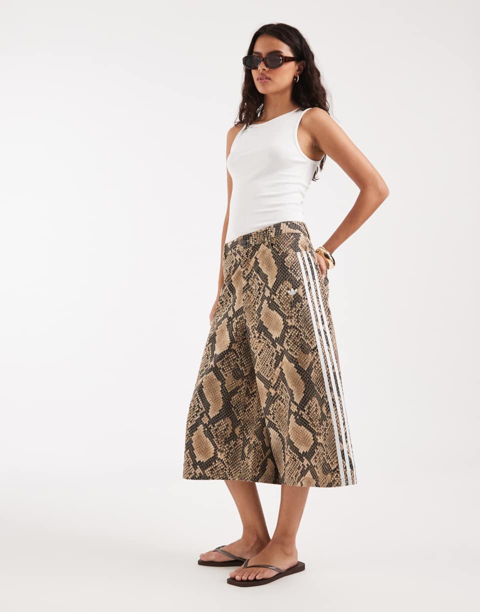 Snake print denim shorts