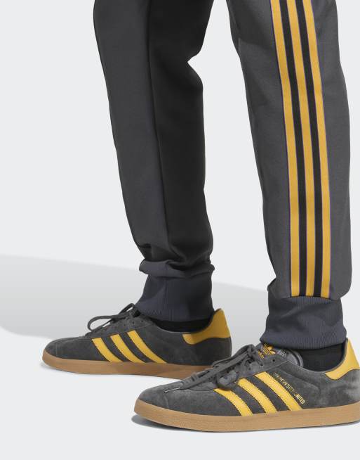 adidas Originals Manchester united terrace icons track pants in