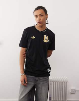 adidas Originals Manchester United VRCT Tee in black | ASOS