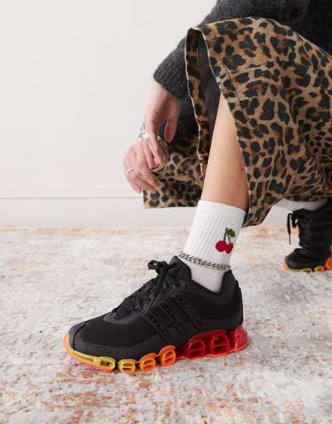 adidas Originals Megaride trainers in black and red - view 1
