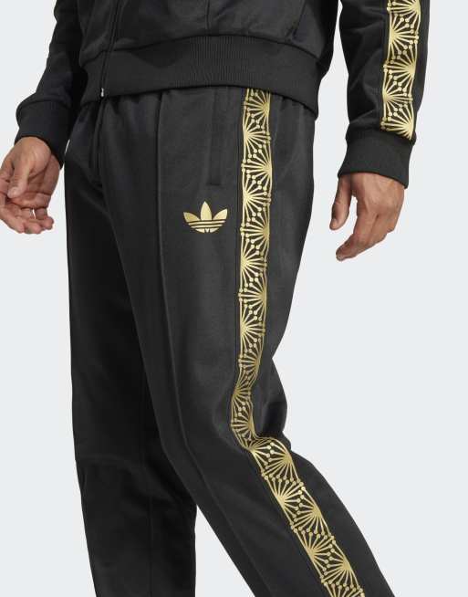 adidas Originals Mexico gold track pants in black ASOS