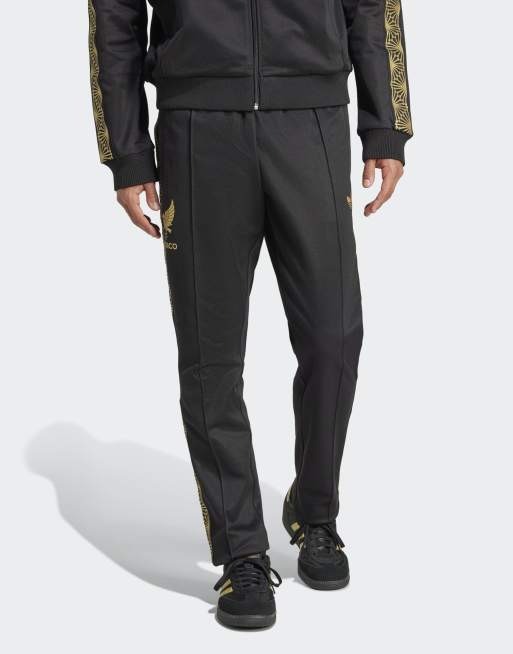 adidas Originals - Mexico - Trainingsbroek met goudkleurige bies in zwart
