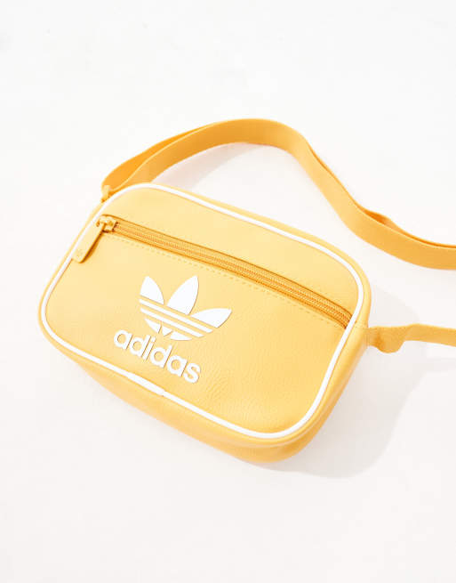 adidas Originals mini airline bag in yellow ASOS