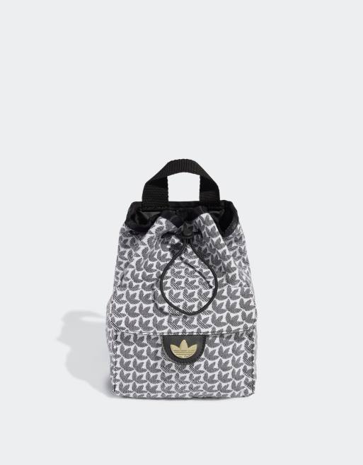 Adidas originals mini backpack in black and hotsell white spots