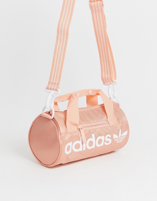 adidas Originals mini duffle bag in pink | ASOS