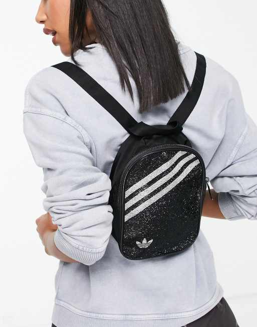 adidas Originals Mini Rucksack in Schwarz mit drei Streifen und Glitzersteinen ASOS